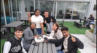 Students on the balcony at IH Cape Town.