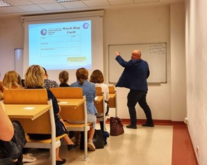 Glenn Standish presents a session on incorporating emergent language.